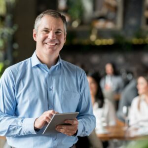 business owner on tablet
