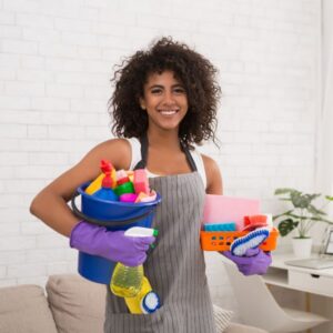 woman with cleaning supplies