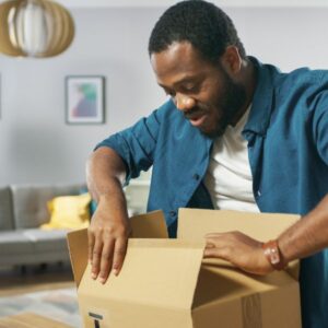 man opening box