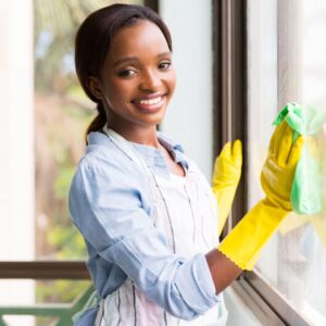 woman cleaning a window