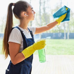 woman cleaning glass