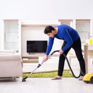 person using a vacuum