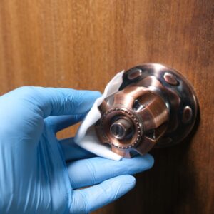 wiping a door knob