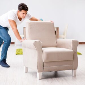 person moving a chair