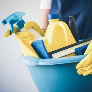 cleaning supplies in a bucket