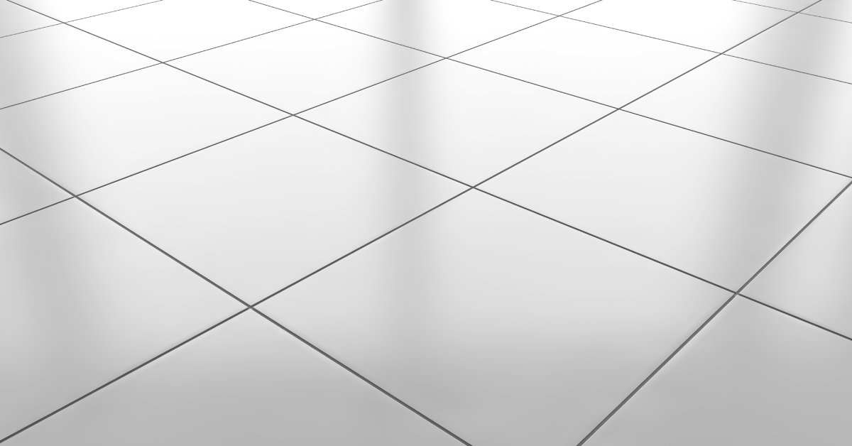 A clean white tile floor with a grid line texture providing a shiny and symmetrical surface with windows and a sliding door.