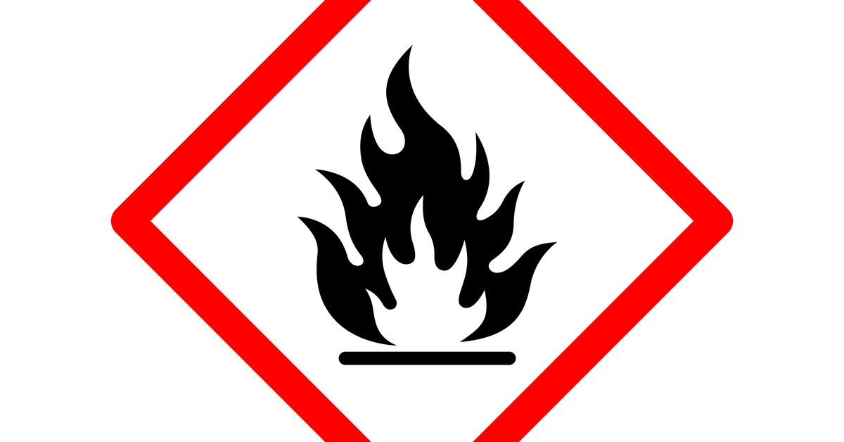 Large flammable symbol with a white flame inside a large black flame surrounded by a large red rhombus.